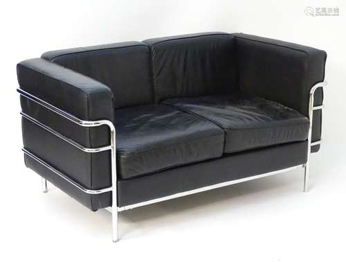 A late 20thC Le Corbusier LC3 settee with leather backrests, seats, arms and a chromed frame.