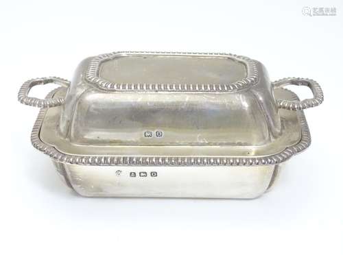 A small silver butter dish and cover Hallmarked Birmingham 1913 maker Adie Bros Ltd. 4 1/4