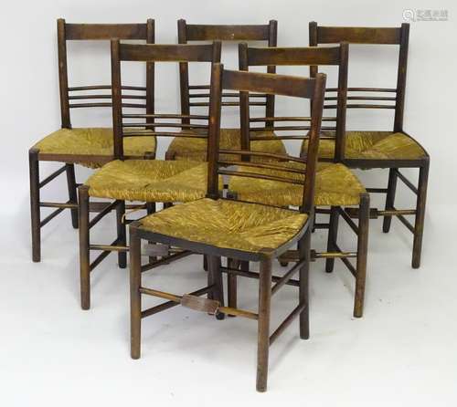 A set of six late 19thC ash and beech Morris & Co. style chairs, having envelope rush seats above