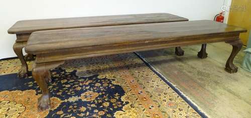 A pair of late 19thC oak refectory tables with planked tops and standing on large cabriole legs