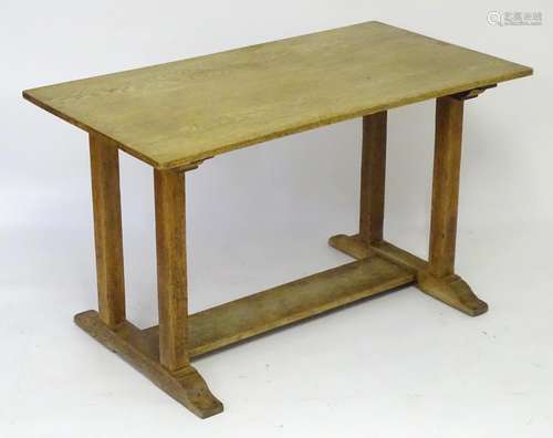 An early 20thC oak Heals library table / refectory table. See similar 'Sir Ambrose Heal and the Heal