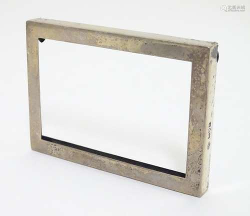 A silver photograph frame surround hallmarked London 1904 maker Carrington & Co (John Bodman