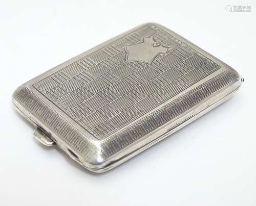 A silver match book / vesta case with basket weave engine turned decoration hallmarked Birmingham