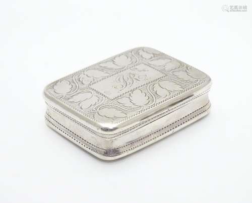 A Geo III silver snuff box with engraved decoration. Hallmarked Birmingham 1809 maker Samuel