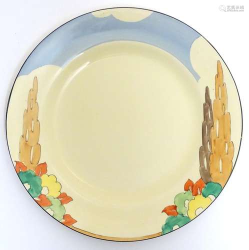 A Clarice Cliff plate, marked to reverse Bizarre by Clarice Cliff. Approx. 10