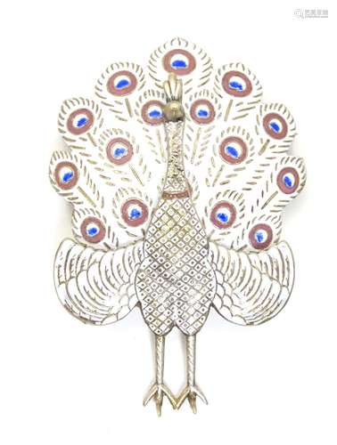 An articulated white metal brooch formed as a peacock with enamel decoration Approx 2 1/4