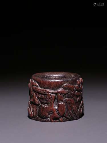 A Chinese Agarwood Thumb Ring With Pattern