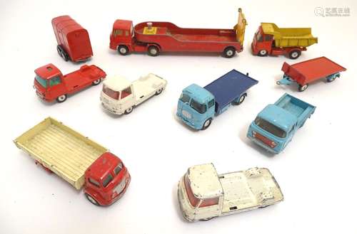 Toys: A quantity of Corgi Toys die cast scale model vehicles comprising E. R. F. Model 44G Flatbed