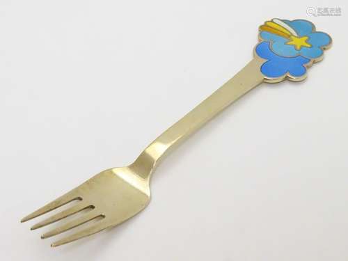 Scandinavian silver : A Danish sterling silver gilt and enamel 1975 Christmas fork with shooting