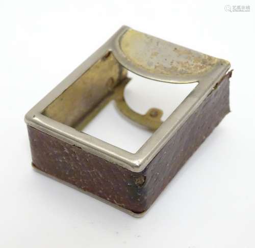 A miniature deck of playing cards contained within a silver plate and leather case. Approx 1 3/4