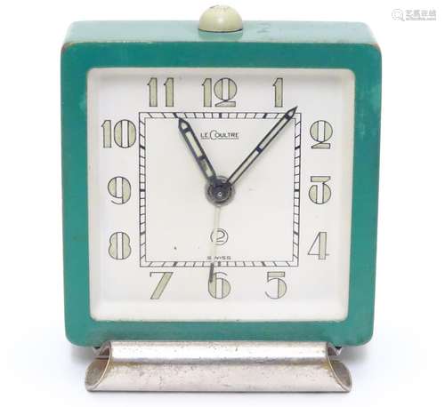 An Art Deco alarm clock by LeCoultre, Switzerland, of squared form, the dial signed LeCoultre,