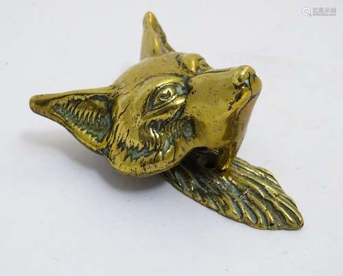 A late 19th / early 20thC door knocker formed as the head of a fox. Approx. 3 1/2