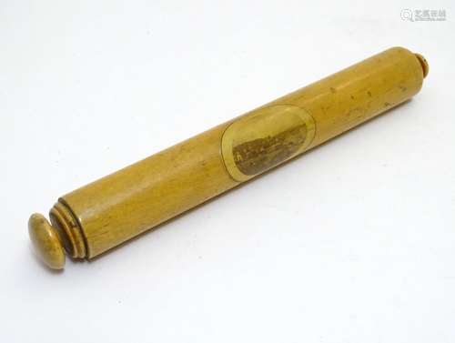 A 19thC Mauchline ware cylinder rule with concealed pencil to one end, with a vignette depicting