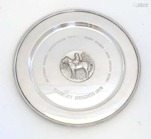 A silver salver / trophy plate with horse and jockey medallion to centre engraved Shirley Heights