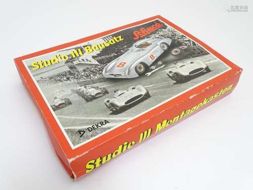 Toys: A Schuco clockwork tin model car kit, Studio III Bausatz Mercedes Benz W196. Boxed with