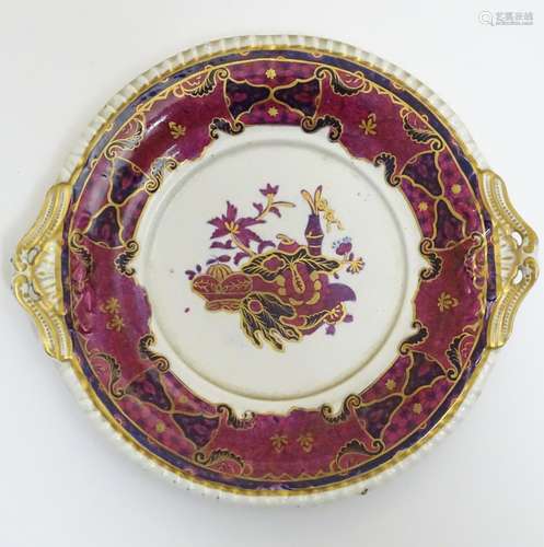 A twin handled Spode plate in the pattern Imperial. Approx. 8 1/2