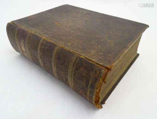 Book: A large 19thC illustrated Family Bible, the binding having tooled decoration. Published by