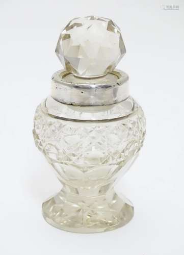 A cut glass pedestal scent bottle with silver collar Hallmarked Birmingham 1908 maker James Deakin &