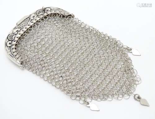 A ladies white metal purse with chain mesh body. Approx 4 1/