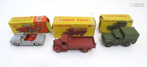 Toys: Three Dinky Toys die cast scale model vehicles / cars, comprising Austin Covered Wagon, no.