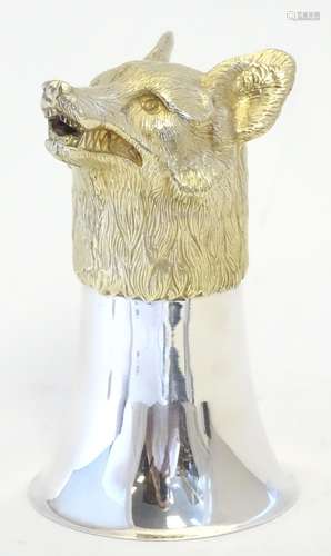 An Irish silver fox head stirrup cup, the fox head with gilt decoration. Hallmarked Dublin 1999