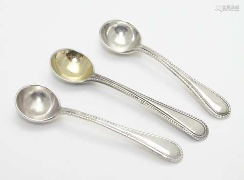 A pair of silver salt spoons hallmarked London 1881 maker Walter & John Barnard together with