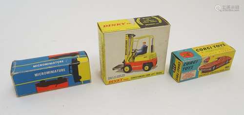 Toys: Three die cast scale model empty car / vehicle boxes, comprising Dinky Toys Conveyancer Fork