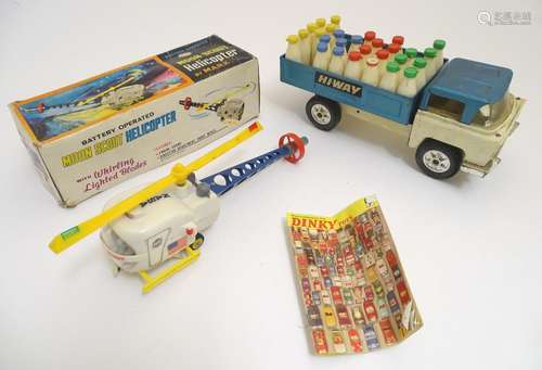 Toys: A tinplate Triang Hi-way Milk Float / truck with milk bottles. Together with a Marx Toys