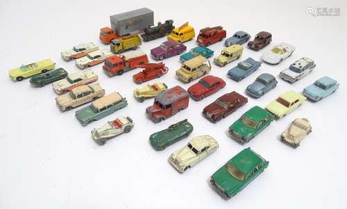 Toys: A large quantity of Lesney / Moko / Matchbox die cast scale model cars / vehicles comprising 1