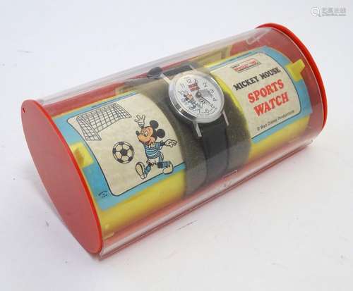 Toy: A Bradley Time Mickey Mouse Sports Watch, the crown at 2 o'clock, the dial with Mickey Mouse