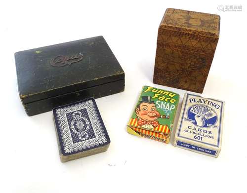 Toys: An early 20thC pokerwork double card box with floral decoration, containing a pack of Club