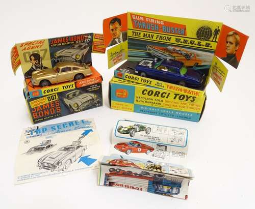 Toys: Two Corgi Toys die cast scale model cars comprising Gun Firing Thrush-Buster from the film The