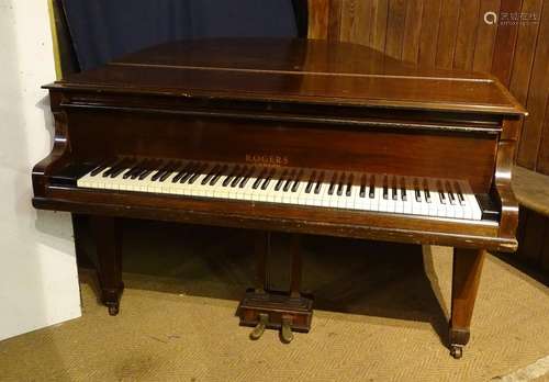 A baby grand piano by Rogers, London, with 88 keys, sustain and damper pedals, 5' (60