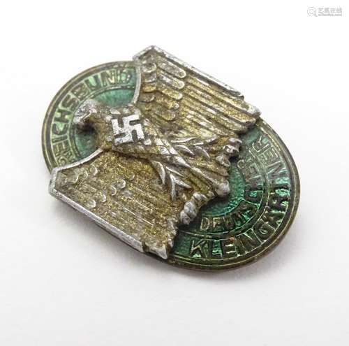 Militaria : a German c1940 enamelled pin badge of the Reichsbund Deutscher Kleingärtner (