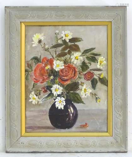 Manner of Marcel Dyf (1899-1985), Oil on canvas, A still life study of flowers, red roses and dog