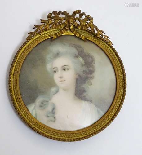 A 20thC portrait miniature print depicting a portrait of a lady in the manner of Sir Joshua