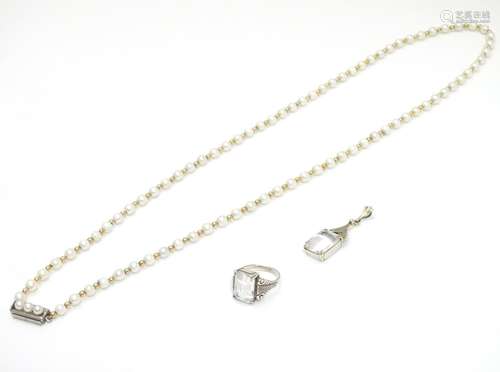 Three items of jewellery comprising a pearl necklace with white metal clasp approx 26