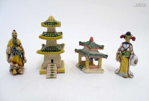 Four French hand painted ceramic items inspired by Japanese culture comprising two pagoda buildings,