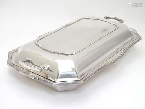 An Art Deco silver plate entree dish and cover by Asprey. 13