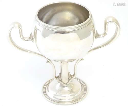 A silver plate Art Nouveau twin handled trophy cup 9