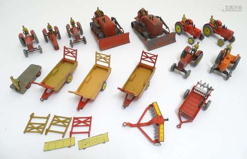 Toys: A quantity of Dinky Toys die cast scale model farm vehicles comprising Massey-Harris Tractor