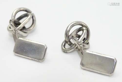 A pair of Continental silver cufflinks Please Note - we do not make reference to the condition of