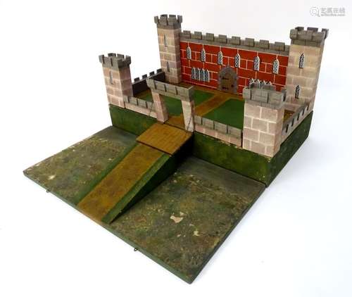 Toy: A WW2 (World War Two) era scratch built model of a four turreted castle with draw bridge, the