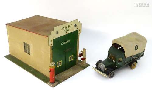 Toy: A WW2 (World War Two) era scratch built model of Art Deco garage, the tiled flat sloping roof