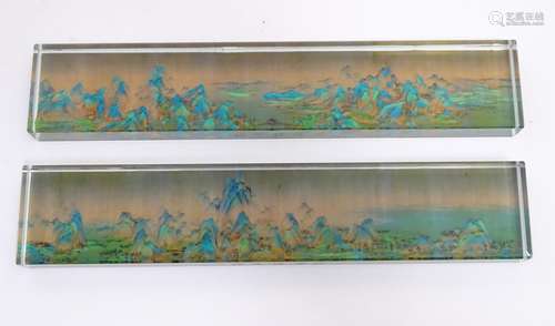 Two 21stC Oriental glass desk paperweights of rectangular form, one depicting a mountainous