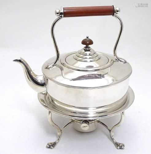 A silver plate spirit kettle and stand with burner under, maker Hukin & Heath. 10