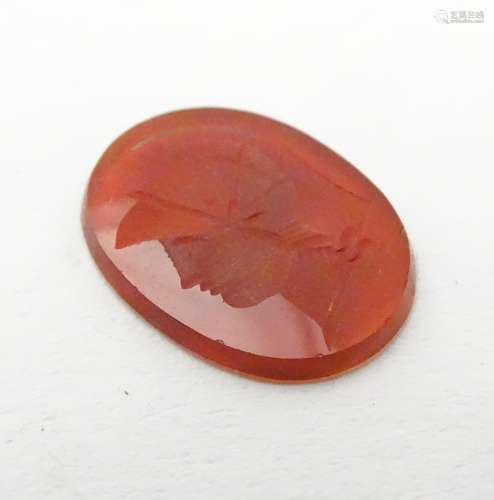 A carnelian intaglio seal unmounted depicting head of a Greco Roman warrior. Approx. 1/2