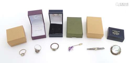 Assorted jewellery including a carved cameo , white metal brooch, rings etc Please Note - we do