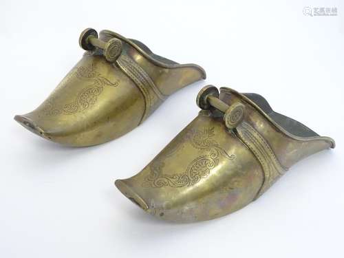 A pair of 19thC South American brass horse riding stirrup shoes with engraved decoration. Approx.