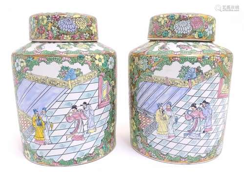 A pair of Chinese jars and covers profusely decorated with flowers and foliage, with two lobed